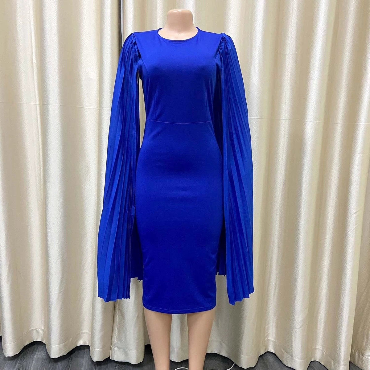 The Scarlet Grandeur Pleated Cape Dress