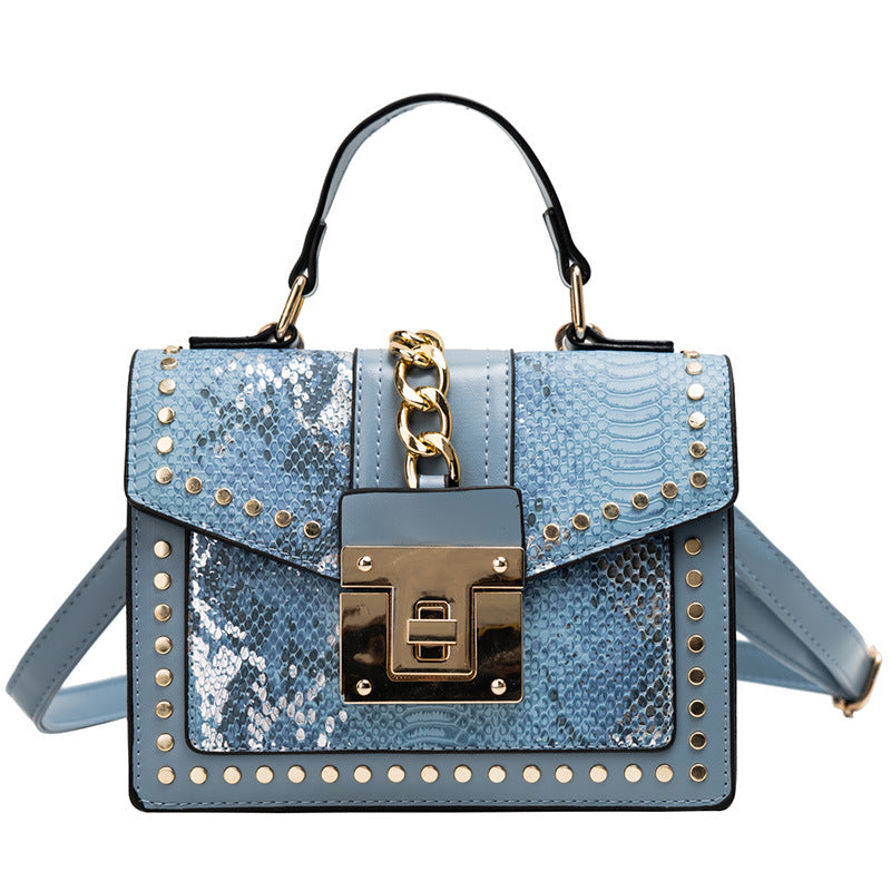 Fashion snake pattern handbag See size chart under “more details”