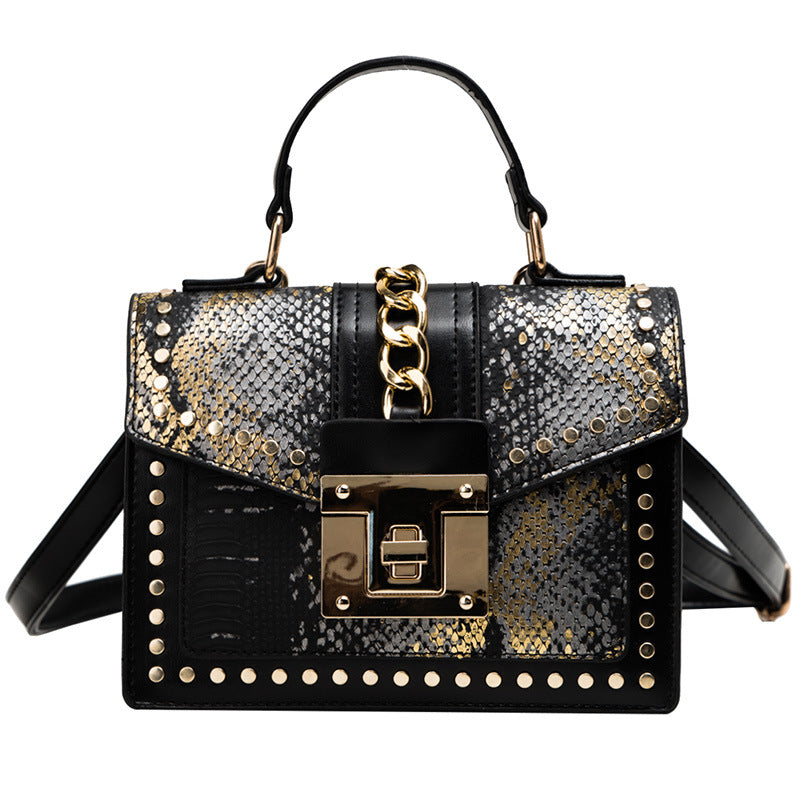 Fashion snake pattern handbag See size chart under “more details”