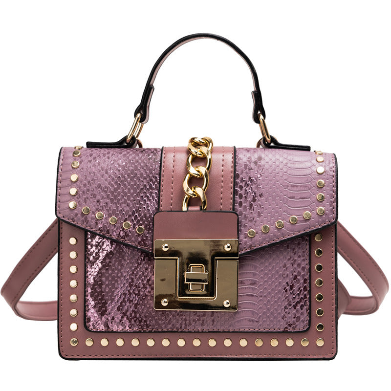 Fashion snake pattern handbag See size chart under “more details”