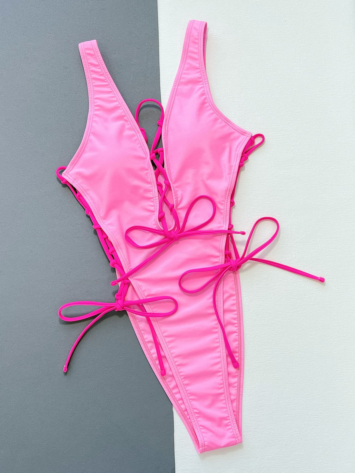 The Pink Escape Lace-Up Plunge One-Piece