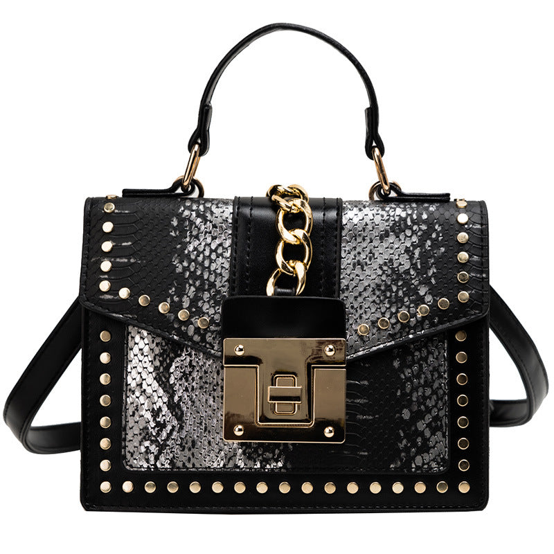 Fashion snake pattern handbag See size chart under “more details”