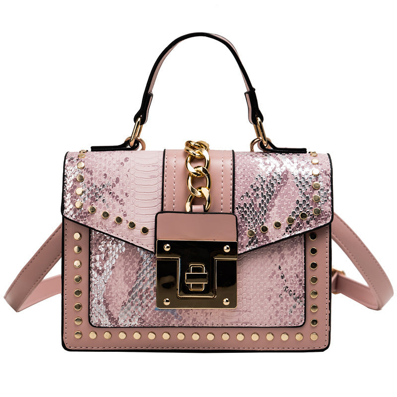 Fashion snake pattern handbag See size chart under “more details”