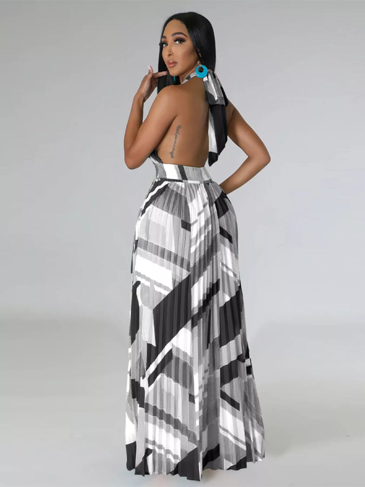 The Halter Geometric Pleated Maxi Dress