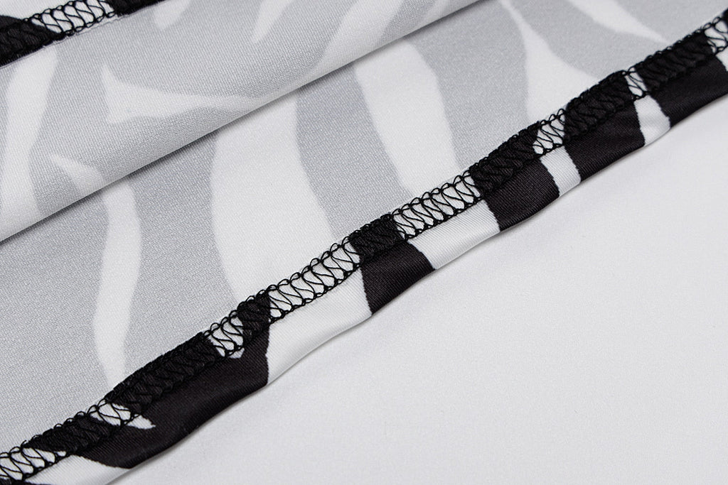 The Zebra Social Plunge Mini Dress
