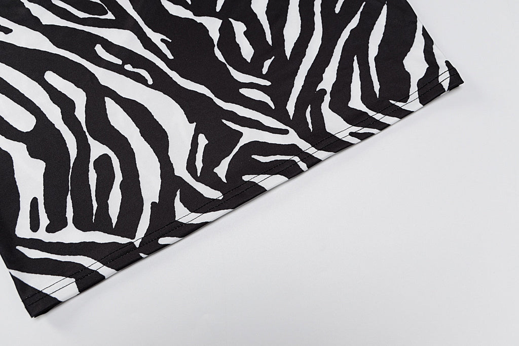 The Zebra Social Plunge Mini Dress