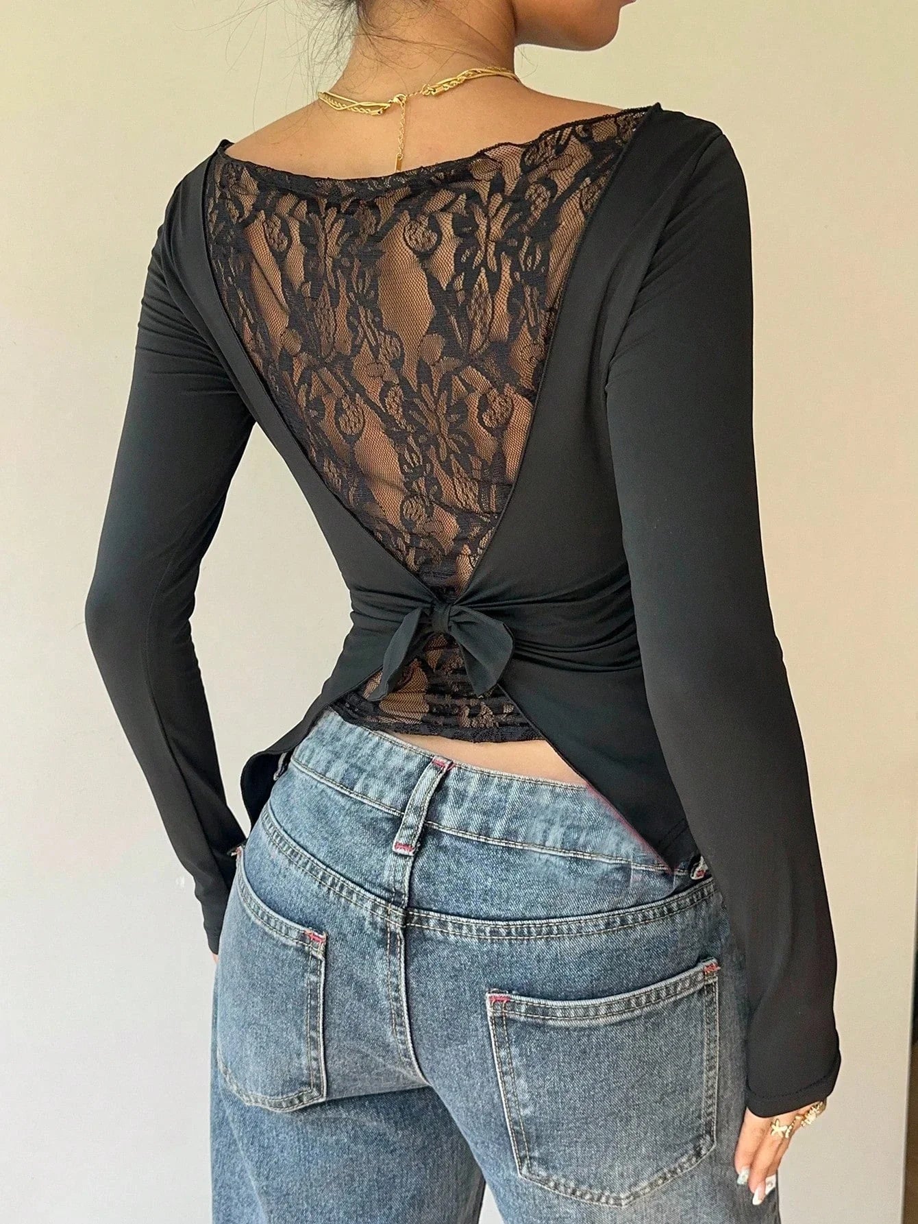 Long-Sleeve Lace Back Bow Top with Asymmetric Hem