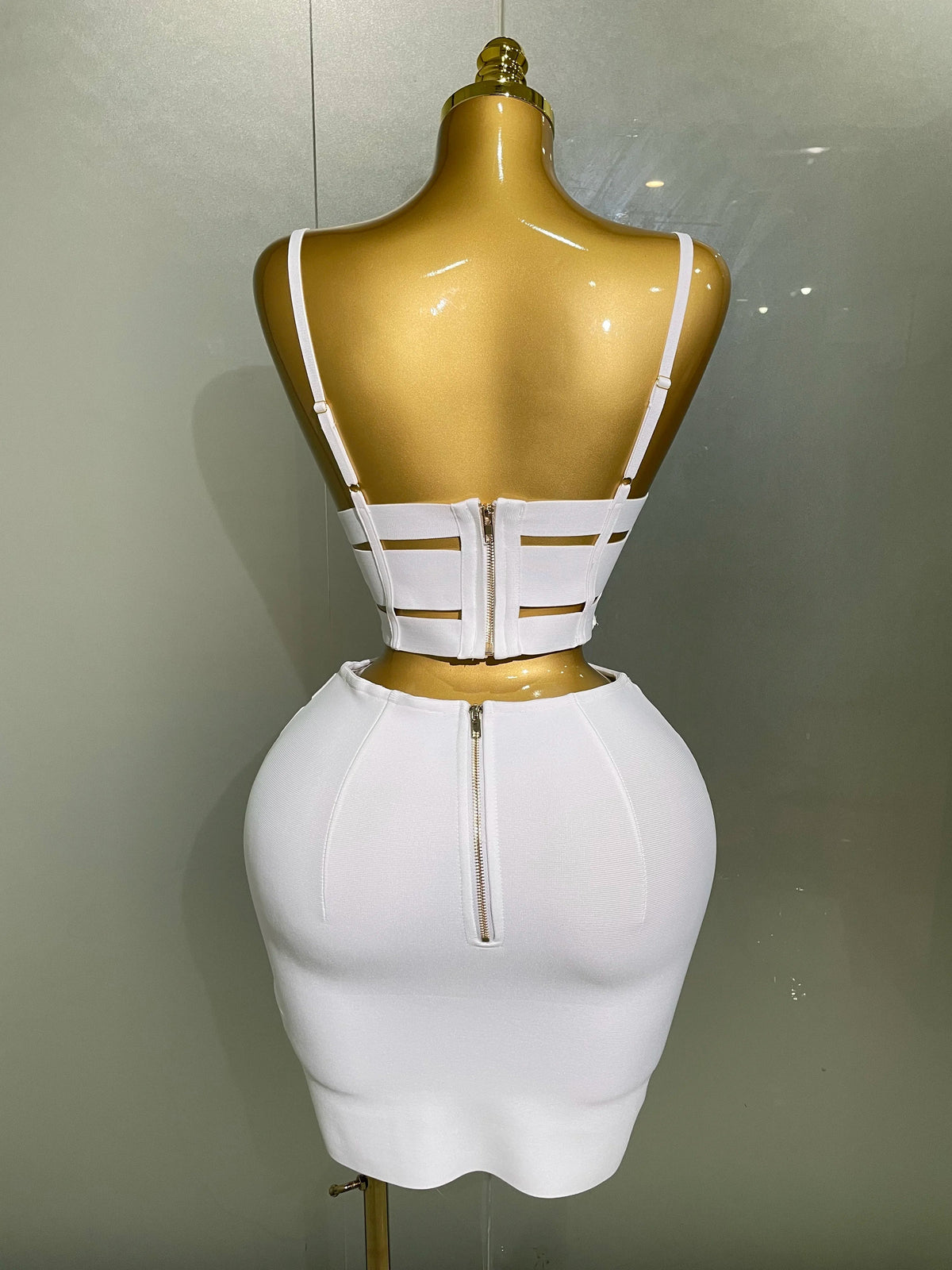 Sculpted Buckle Bandage Bustier & Multi-Buckle Grommet Hardware Bandage Mini Skirt Set