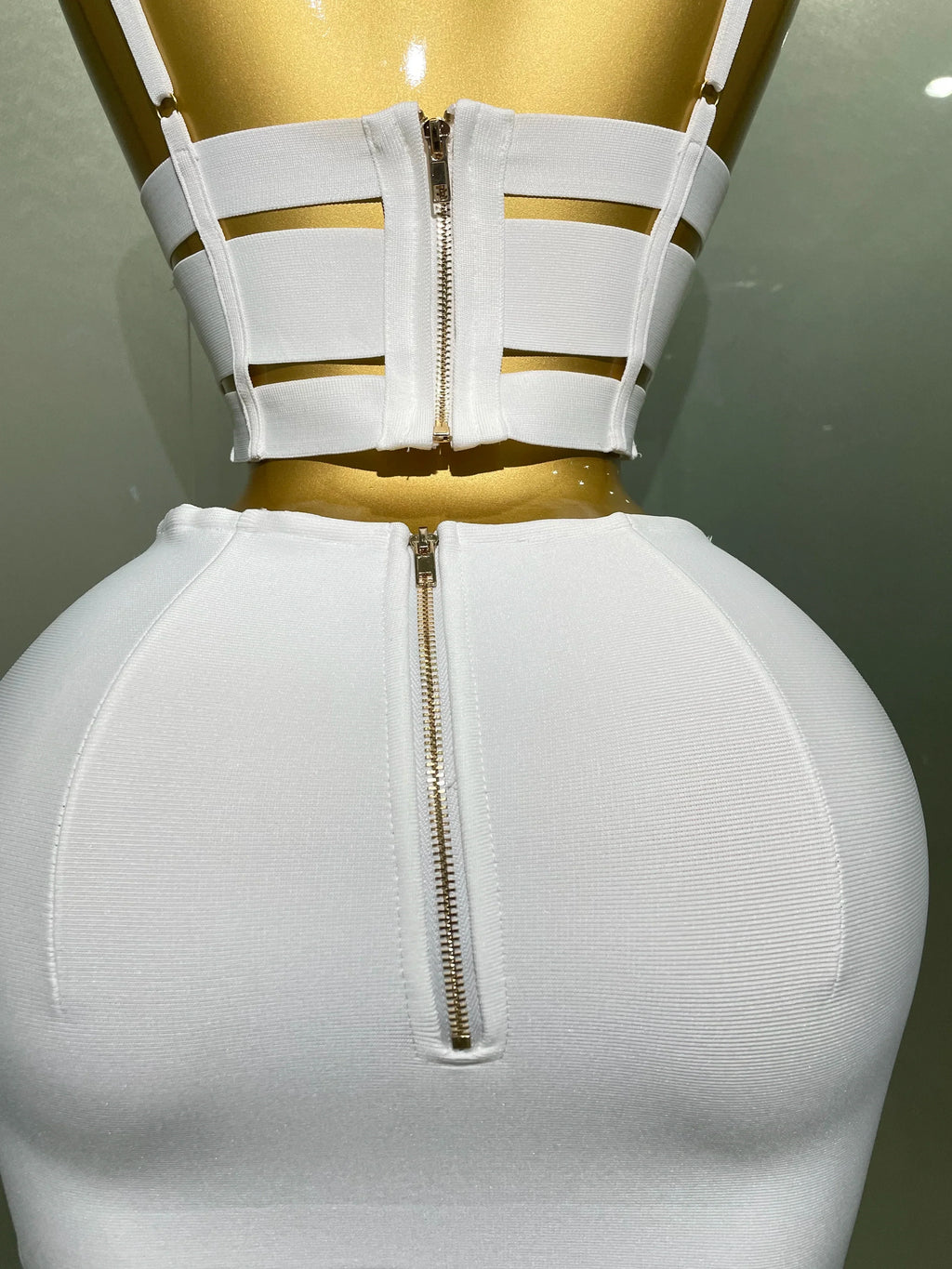 Sculpted Buckle Bandage Bustier & Multi-Buckle Grommet Hardware Bandage Mini Skirt Set