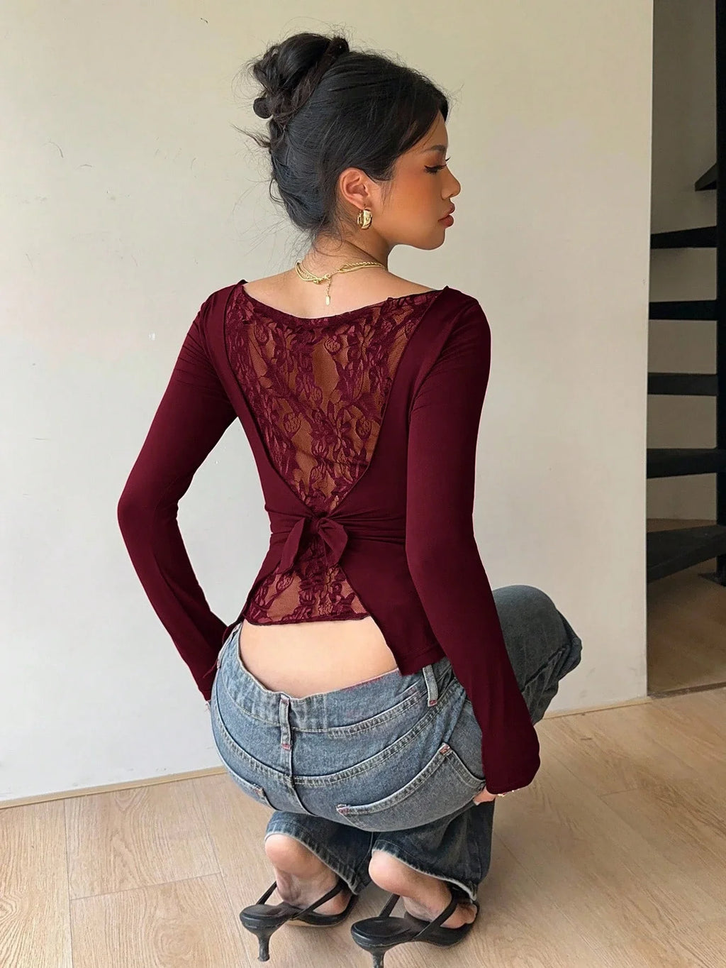 Long-Sleeve Lace Back Bow Top with Asymmetric Hem