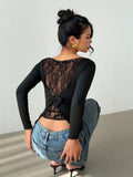Long-Sleeve Lace Back Bow Top with Asymmetric Hem