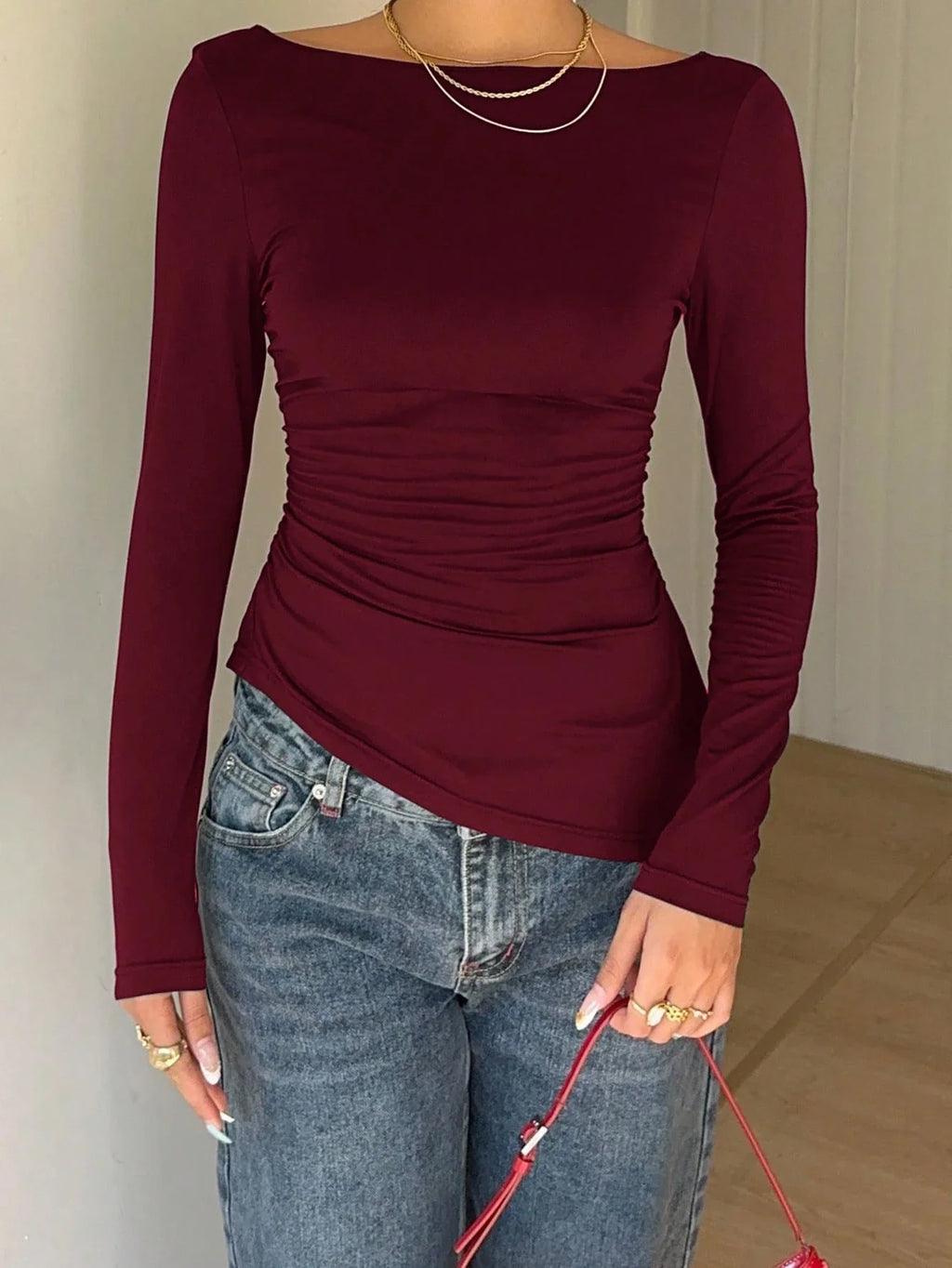 Long-Sleeve Lace Back Bow Top with Asymmetric Hem