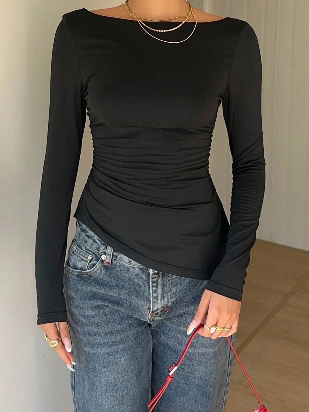 Long-Sleeve Lace Back Bow Top with Asymmetric Hem