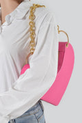 The Oversized Heart Handle Clutch