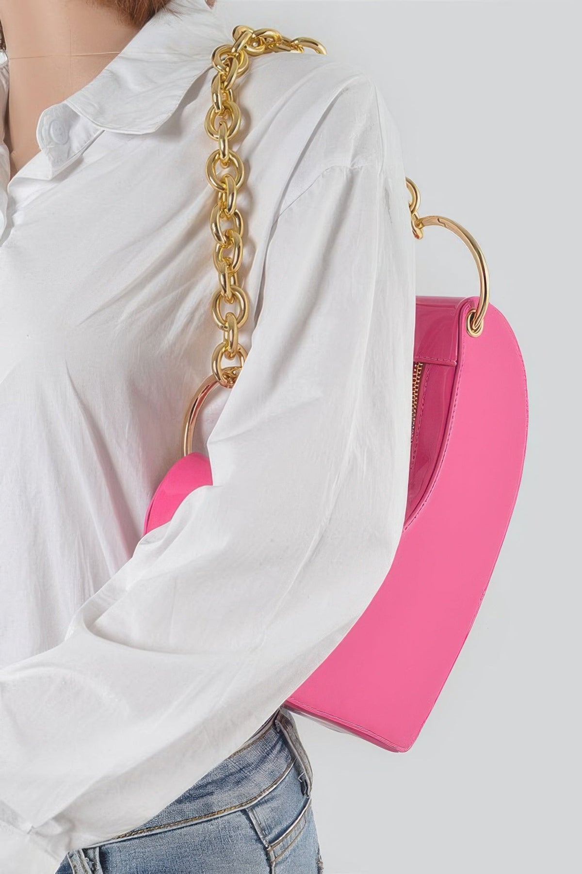 The Oversized Heart Handle Clutch