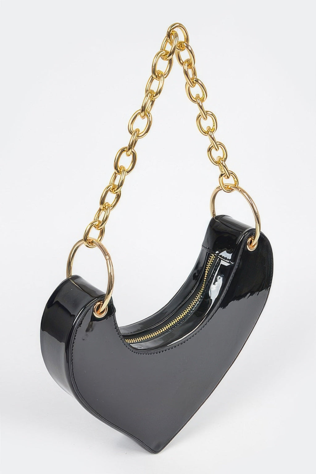 The Oversized Heart Handle Clutch