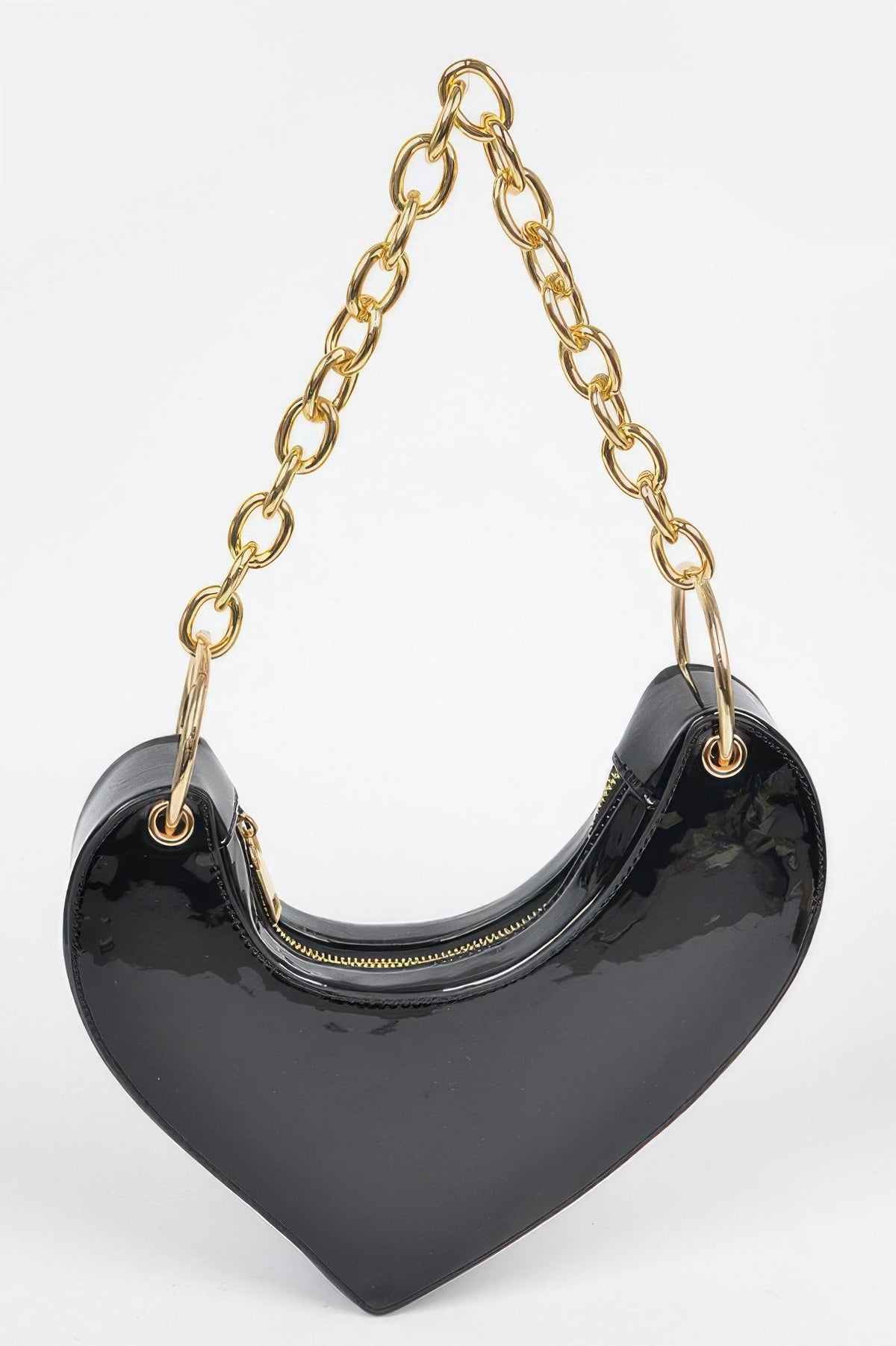 The Oversized Heart Handle Clutch