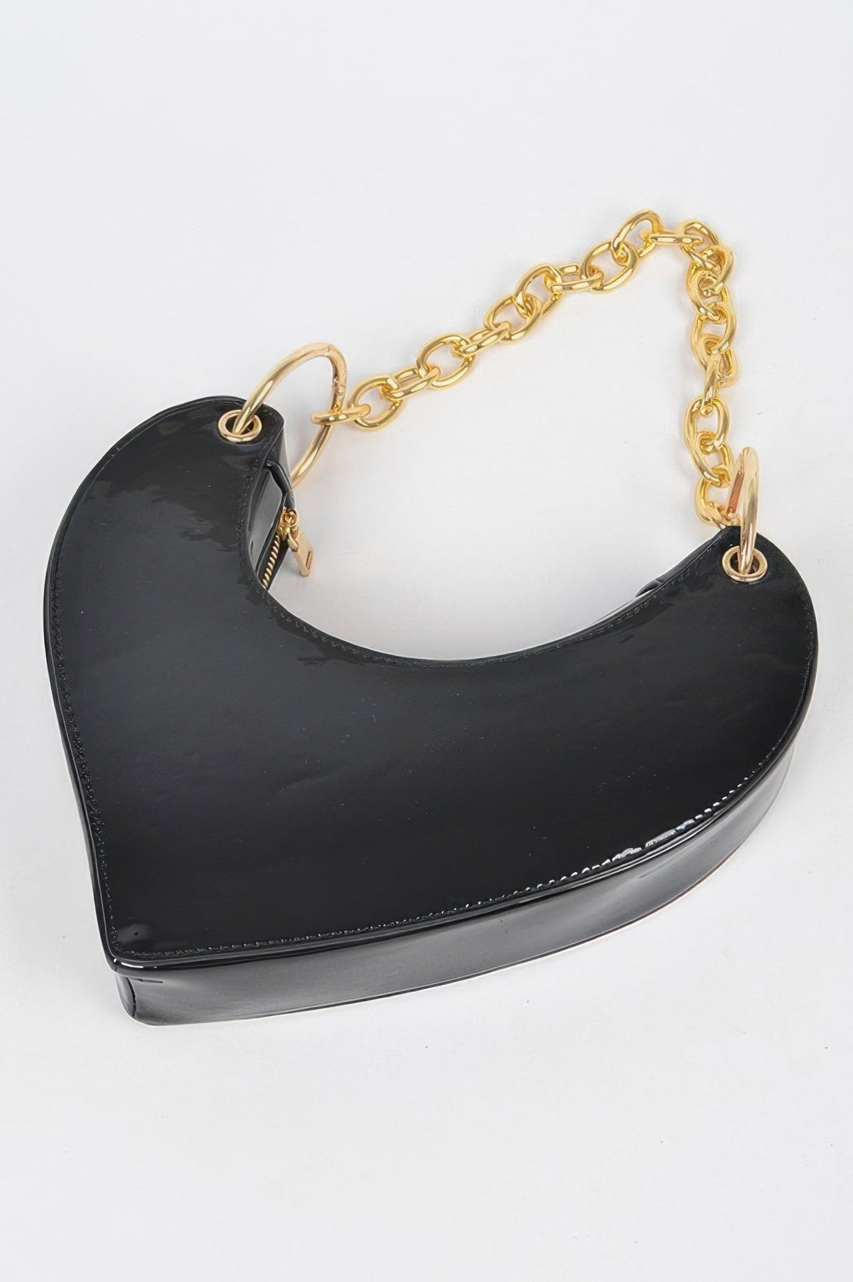 The Oversized Heart Handle Clutch