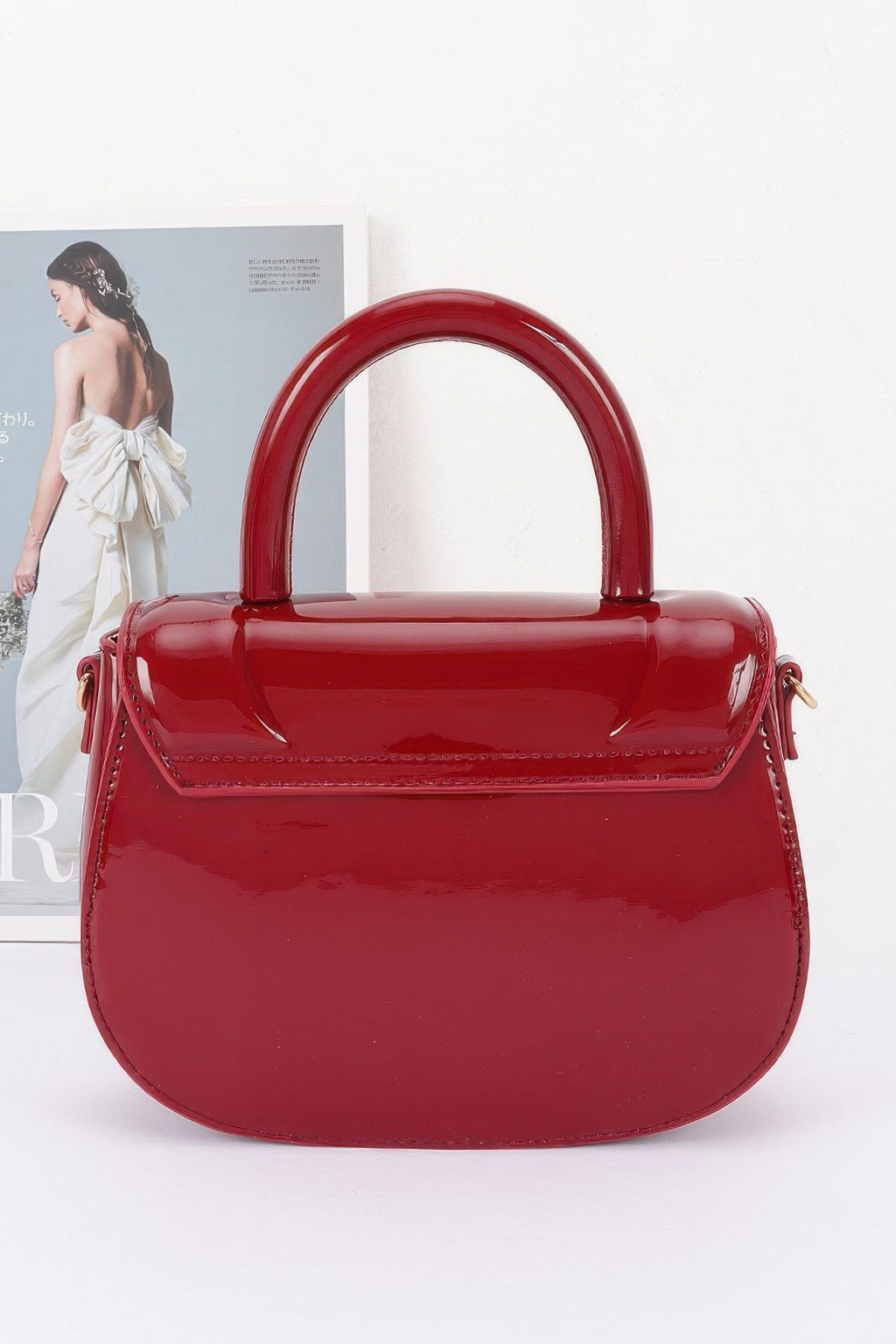 The Glossy Patent Top Handle Bag