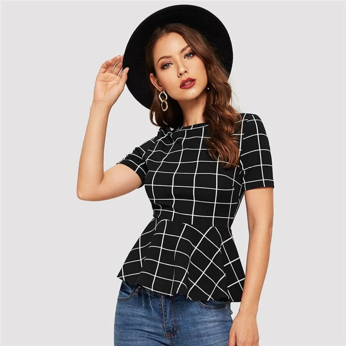 The Uptown Grid Peplum Blouse