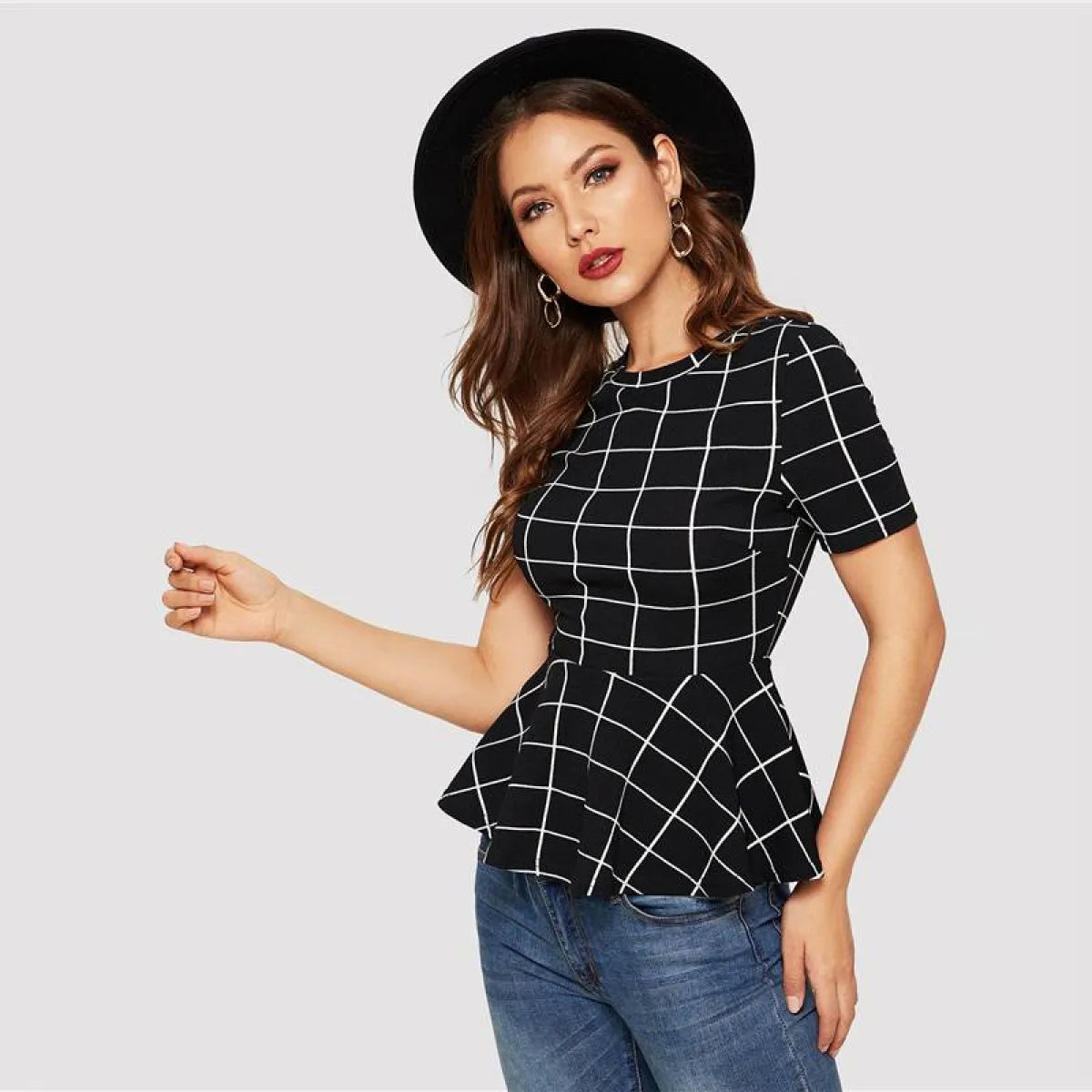The Uptown Grid Peplum Blouse